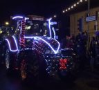 Video: 21 tractors with 39,000 lights drive through a town