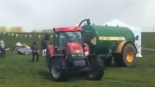 Watch a farmer use a load of slurry to get rid of protesters in his field