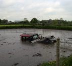 Farmer has lucky escape after tractor becomes submerged in slurry pit