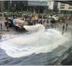Tankers spray 40,000L of milk over EU buildings in Luxembourg in protest