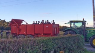 Soccer team hitches lift off tractor and trailer after coach breaks down