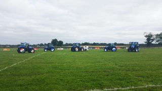 Marty Morrissey takes on the challenge of tractor football at the Ploughing