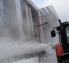 Pics: Farmers coat EU Council buildings with milk powder in protest