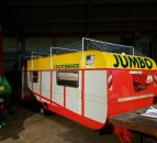 If the season's so busy why not live in your silage wagon?