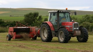 Video: Multiple motorists avoid crashing into tractor and baler combo