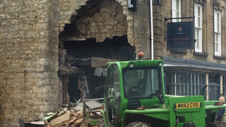 ATM ripped from shop wall using stolen telehandler