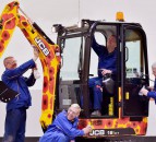 JCB's poppy digger raises £25,000 for centenary appeal
