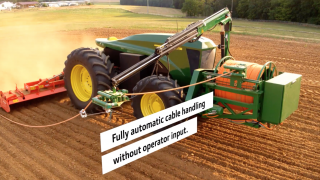 An all-electric John Deere that needs no big battery; just a clever ‘extension cord’