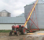 Farmer uses pocket knife to amputate leg following auger incident