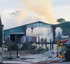 Firefighters tackle blaze affecting 6 barns on Gloucestershire holding