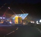 Lorry carrying 190 pigs overturns overnight