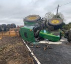 Tractor and trailer with 11t of potatoes overturn on roadside