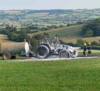 Farmer says 'we need our local fire station' after his tractor goes up in flames