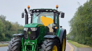 Tractor driver stopped for using mobile phone while driving