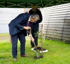 Poots joins with NI scouts to plants tree for region’s centenary