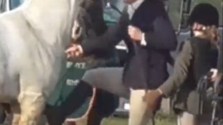 Video: Woman caught kicking and punching horse