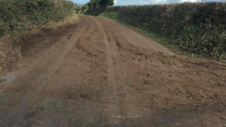 Farmer fined for covering road in mud which led to a collision