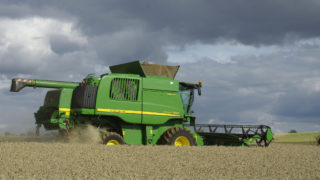 John Deere self-propelled  combines celebrate 75 years