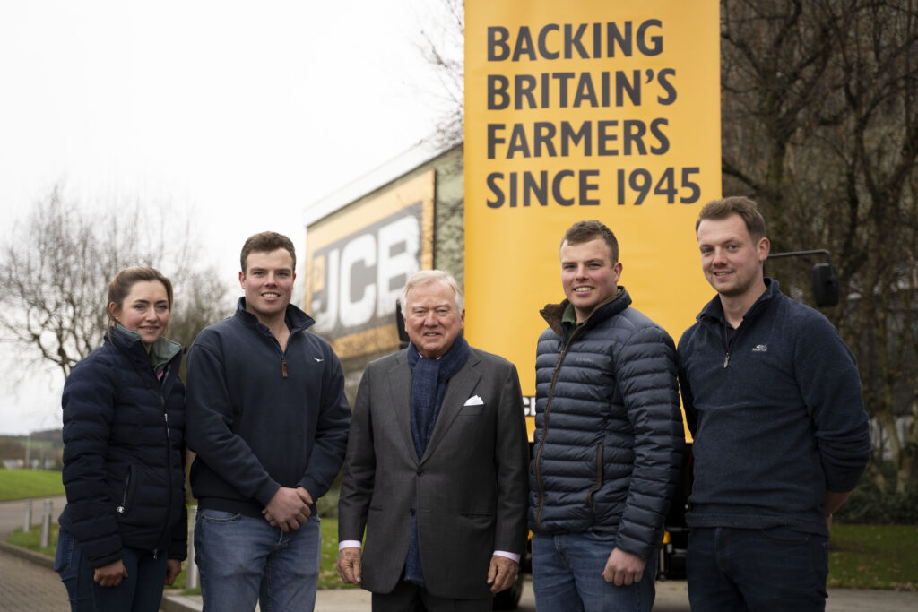 JCB chairman Lord Bamford pictured with some of the JCB employees ahead of their trip to London today