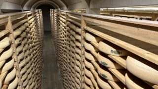 Watch: Comté cheese taste testing in a 100,000 wheel cellar