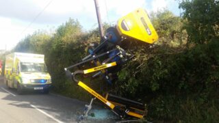 Pics: Farmer has ‘lucky escape’ as tractor overturns while hedgecutting