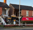 Tractor strikes two houses in Chester following collision
